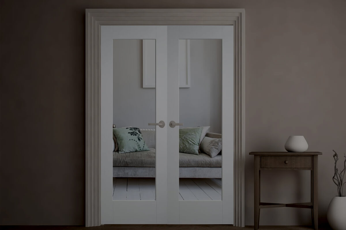 Modern glazed internal doors with clear glass panels in contemporary home hallway