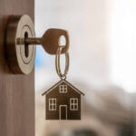 Professional locksmith securing property with deadbolt lock installation for home security and protection