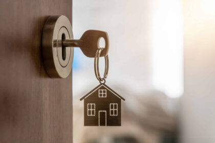 Professional locksmith securing property with deadbolt lock installation for home security and protection