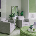 Cohesive home décor example showing unified color palette and repeated design elements across living room spaces