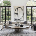 Modern living room showing how to improve your homes interior design with warm colors sustainable materials and comfortable furniture