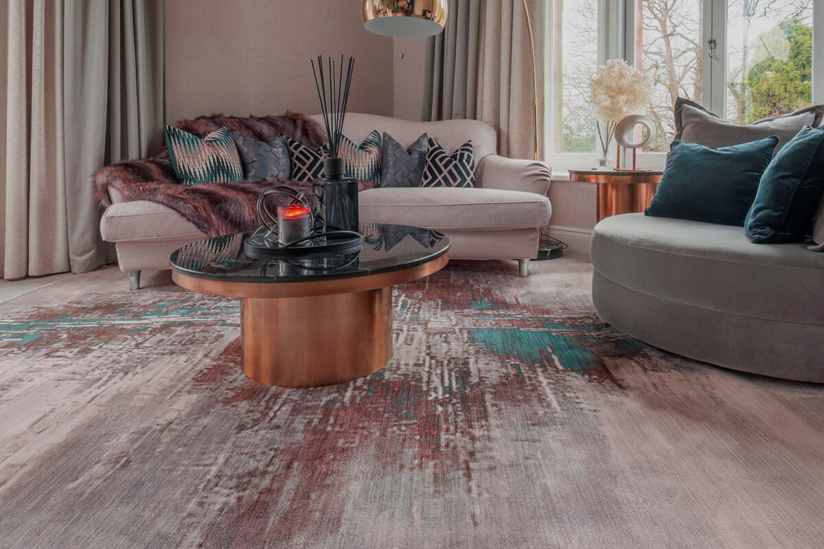 Modern geometric rug in living room with contemporary furniture and neutral color scheme