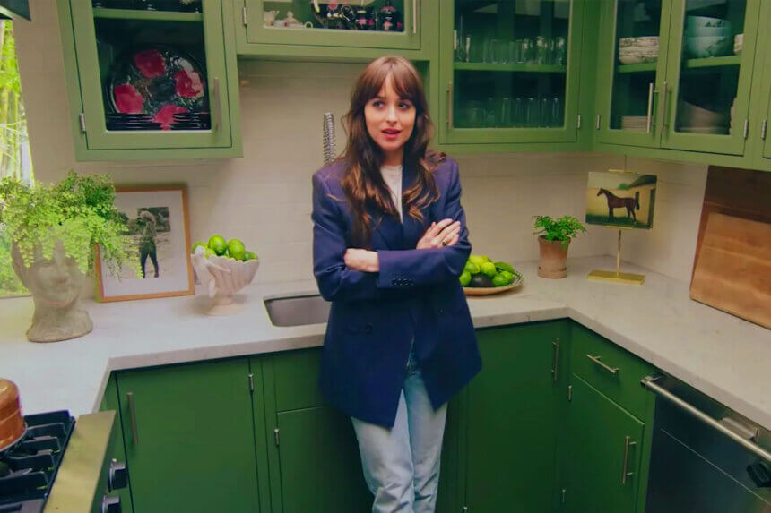 Dakota Johnson kitchen with green cabinets painted in Benjamin Moore Alligator Alley showing small kitchen design ideas