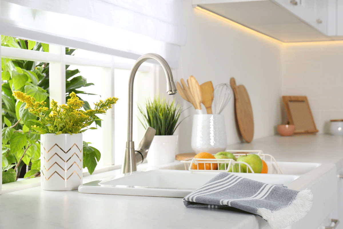 Kitchen organisation ideas showing organized drawers with drawer organizers and labeled storage containers for efficient kitchen storage
