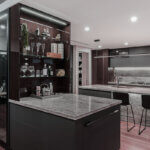 Modern luxury kitchen with smart appliances, quartz countertops, and custom cabinetry featuring elegant design and clean lines