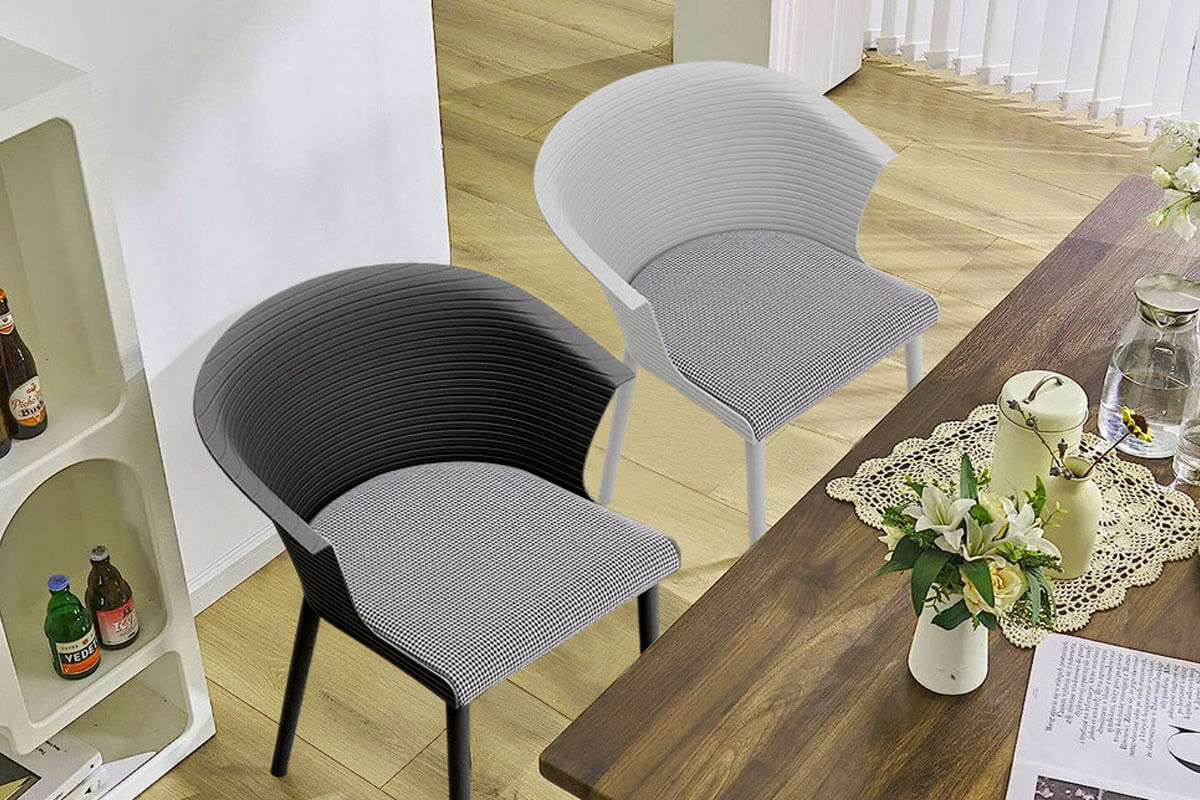 White outdoor stackable plastic chairs arranged on patio showing weather resistant design and space saving storage capability