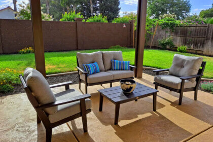 Polywood pool furniture chaise lounge chairs around swimming pool deck with HDPE recycled plastic construction