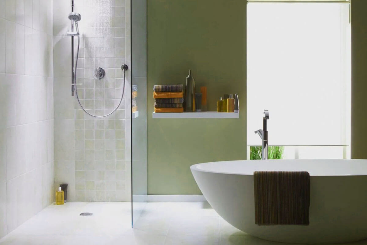 Steam shower installation process showing waterproofing membrane and steam generator setup in modern bathroom renovation