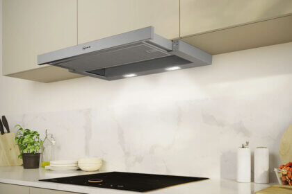 486 Gelyney Extractor Hood installed above kitchen stove with LED lighting and stainless steel finish
