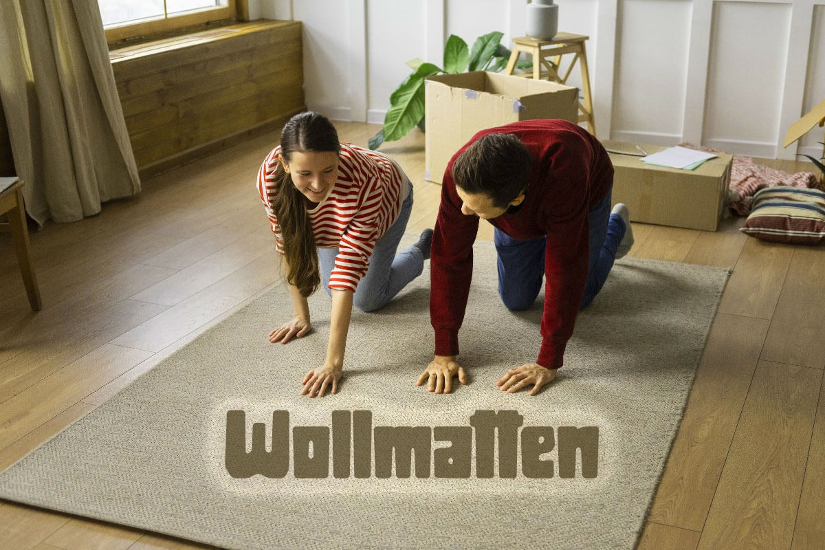 Two people exercising on Wollmatten natural wool mat in modern living room demonstrating comfort and eco-friendly home fitness use
