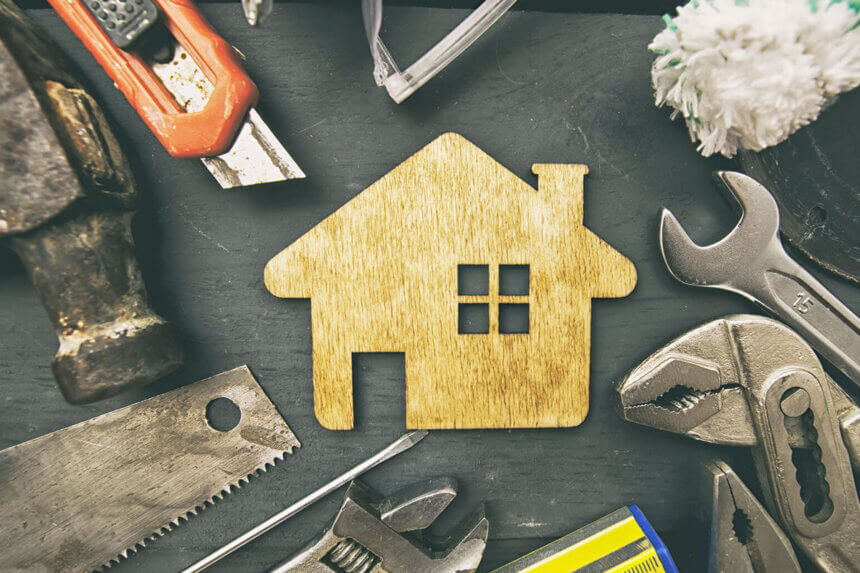 Homeowner using Wutawhelp guides for homes to fix leaky faucet with basic tools