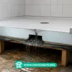 Foam Shower Pan with a flood test leak exposing water beneath the shower base on a bathroom subfloor