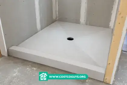 pre sloped shower pan for tile installed in unfinished shower with central drain and cement board walls