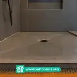 Shower Pan Slope with a center drain on a tiled shower floor showing proper drainage toward the drain
