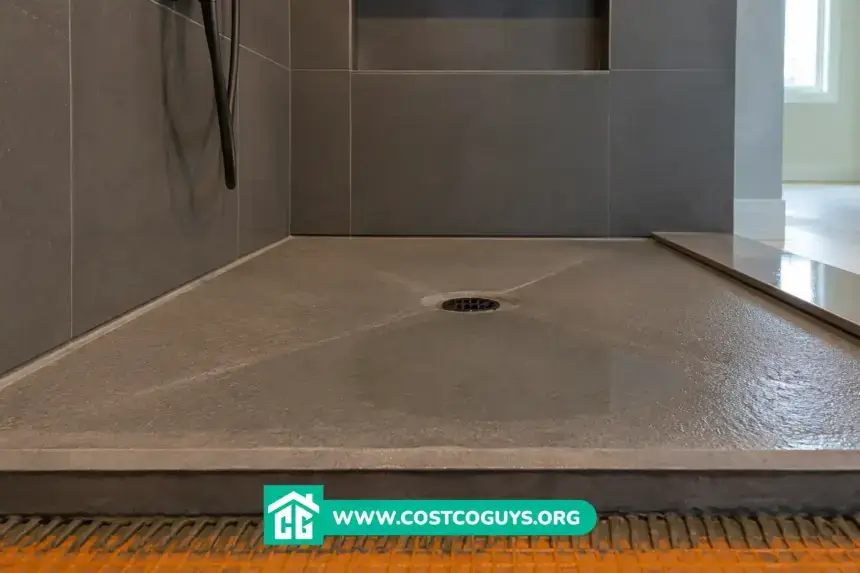 Shower Pan Slope with a center drain on a tiled shower floor showing proper drainage toward the drain