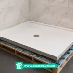 36 x 72 shower pan with linear drain and curb set in a bathroom alcove before tiling