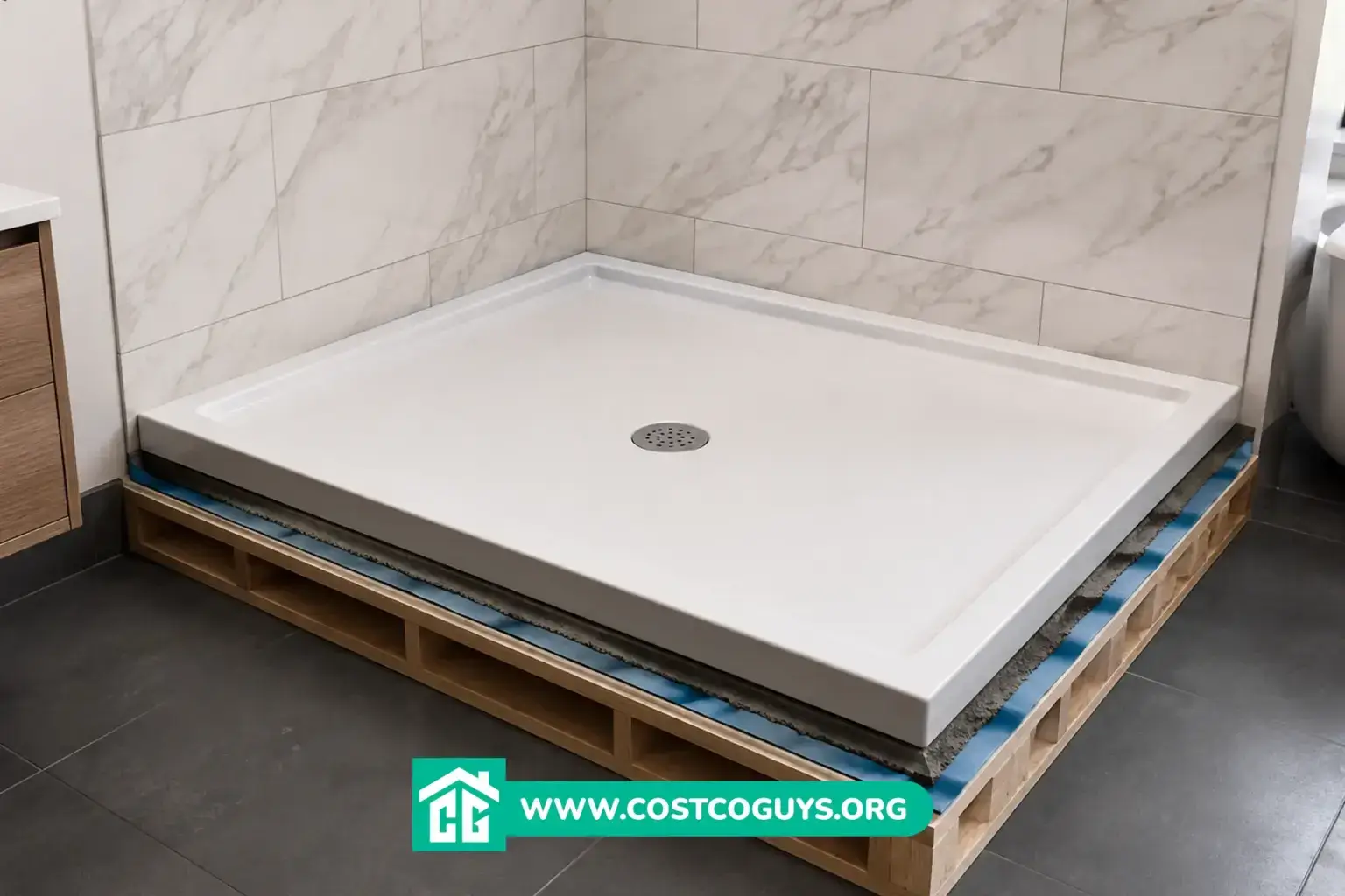 36 x 72 shower pan with linear drain and curb set in a bathroom alcove before tiling