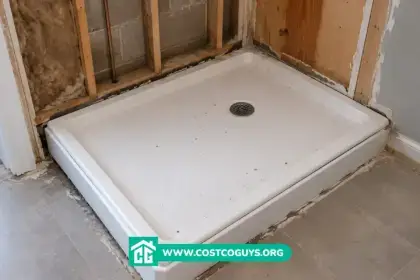 Standard Shower Pan Size shown with a white shower pan in an unfinished bathroom refit