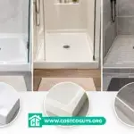White acrylic 30 inch shower pan with center drain set into a framed shower opening