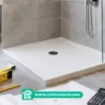 32x36 shower pan with measuring tools, calculator, plans, tiles, and installation
