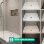 White 36 shower base with center drain set into a framed alcove opening